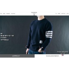 톰* 램스울 절개 사선 니트